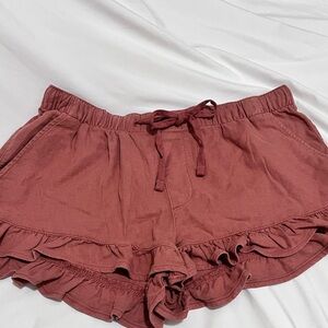 American Eagle Outfitters High Waist Ruffle Shorts in Brick Red